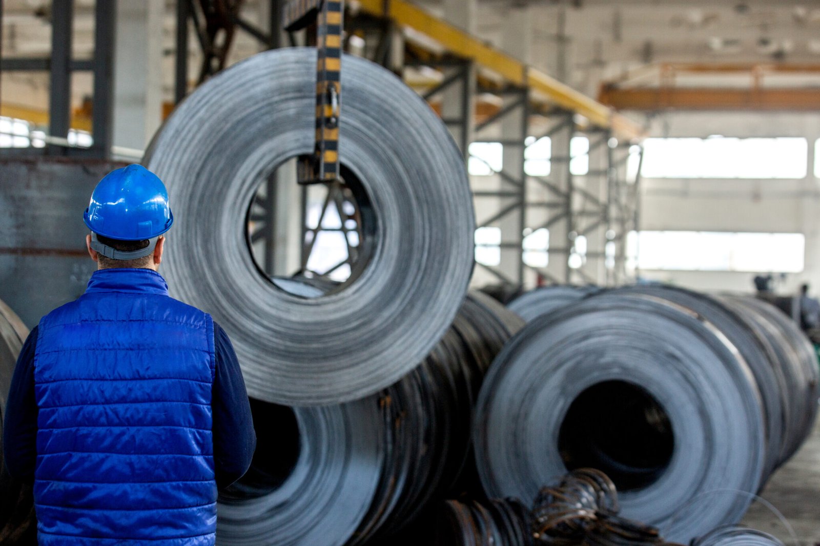 worker in blue construction helmet
